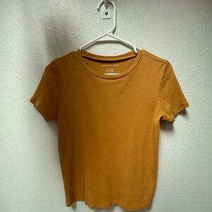 American Eagle T Shirt XS lightly worn Mustard colored